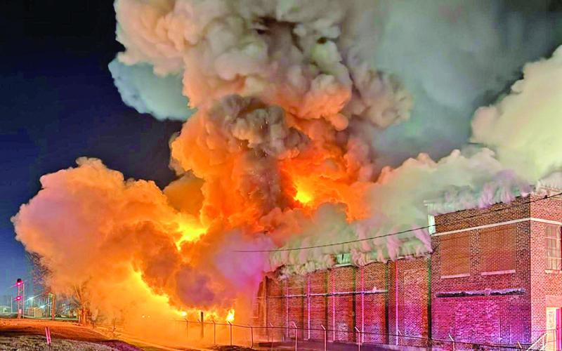 Flames and smoke engulf former milk plant located at 201 East Arkansas Street Photo courtesy of Justin Hargrove