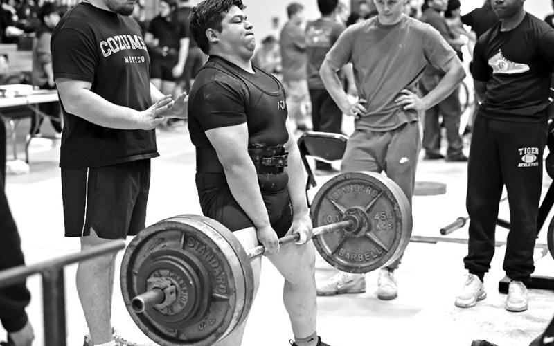 Jose Gonzalez muscles through a dead lift to place 1st at the meet
