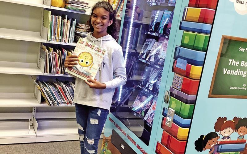 Third-grader Chloe Veasley selects The Smart Cookie