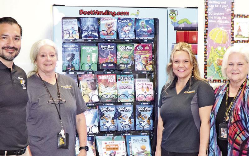 (L to R) Fowler Principal Jonathan Cardenas, Fowler Librarian Margaret Rowland, MPISD Foundation member Becca Bell, MPISD Board member and Foundation member Sandy Bible COURTESY PHOTOS