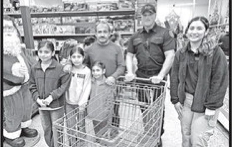‘Shop with First Responders’provides Christmas gifts for over 100 kids
