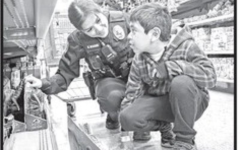 ‘Shop with First Responders’provides Christmas gifts for over 100 kids
