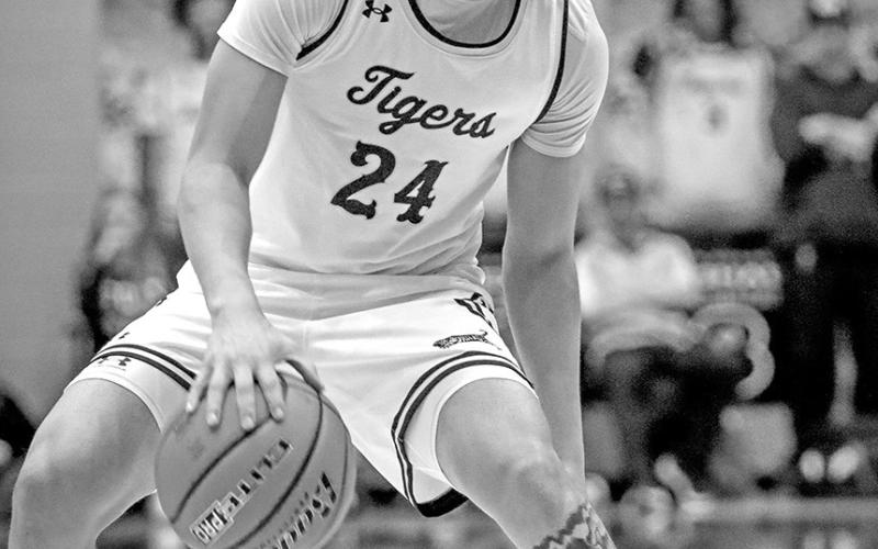 Carter Chism scored early and often to help the Tigers hold off the Marshall Mavs. Chism finished with 19 points for the Tigers.
