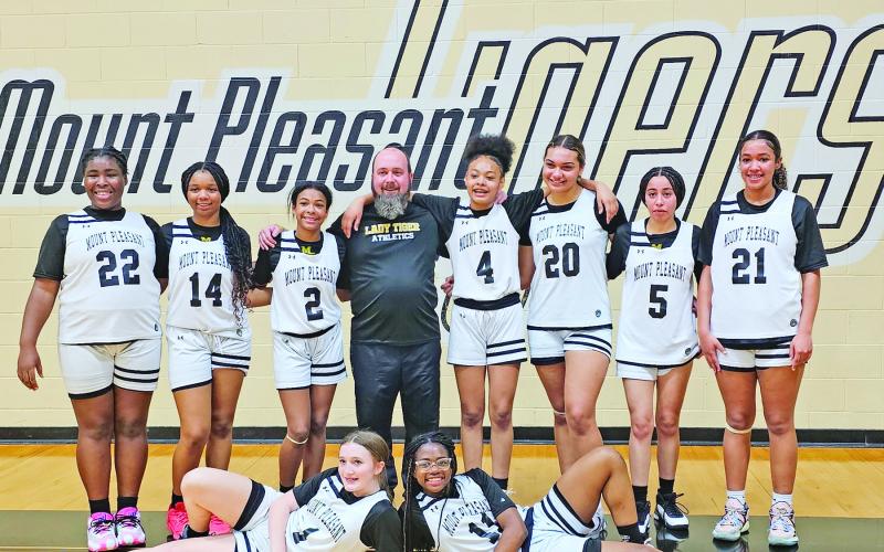 The MPJH 8A Lady Tigers – Back Row: Kenslee Lee, Aubrey Canton, Khiya Bolton, Coach Shelton, Janelle Hurndon, Ava McCrumby, Maliyah Hammons, Rayleigh White. Front Row: Tenley Marshall, Kennedy Jones. (Courtesy photo)