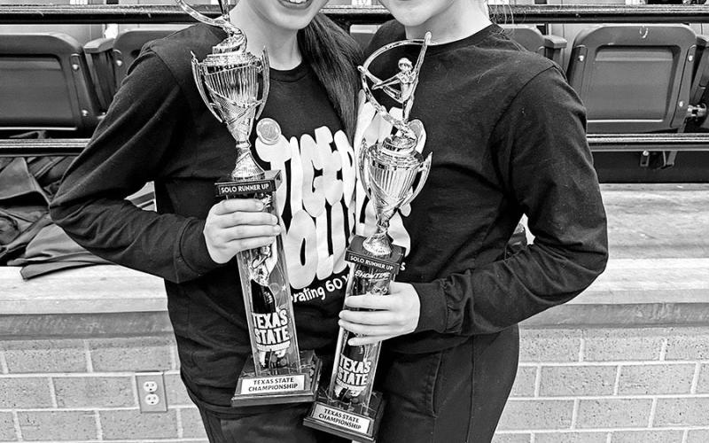 Morgan Zepeda (left) and Chloe Carter (right) with their solo awards