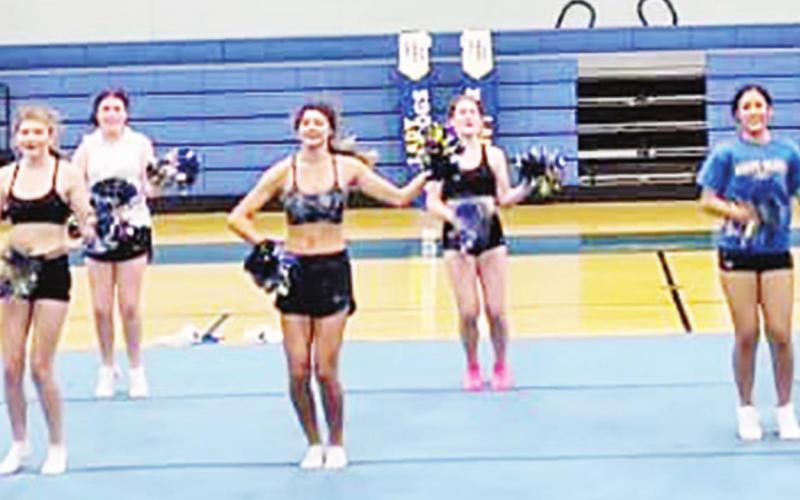 Building pyramids: Harts Bluff cheer holds camp