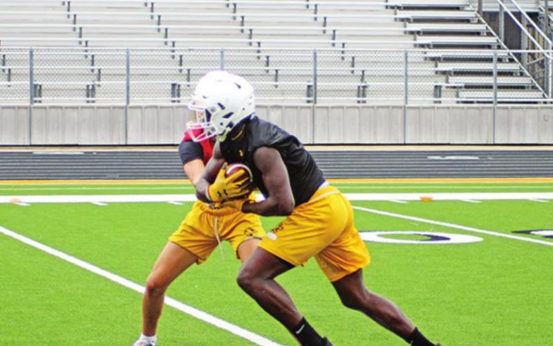 Heating up: football practices begin