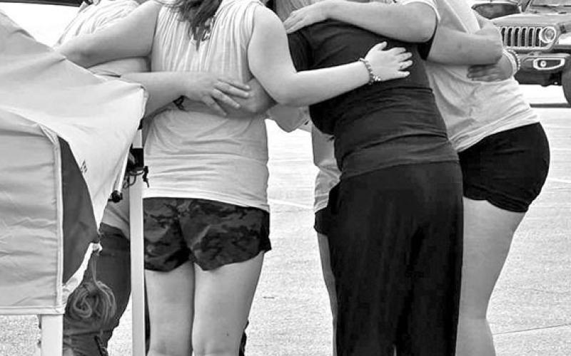 To Kerrville and back: Nevill’s Chapel volunteers pray over disaster survivors