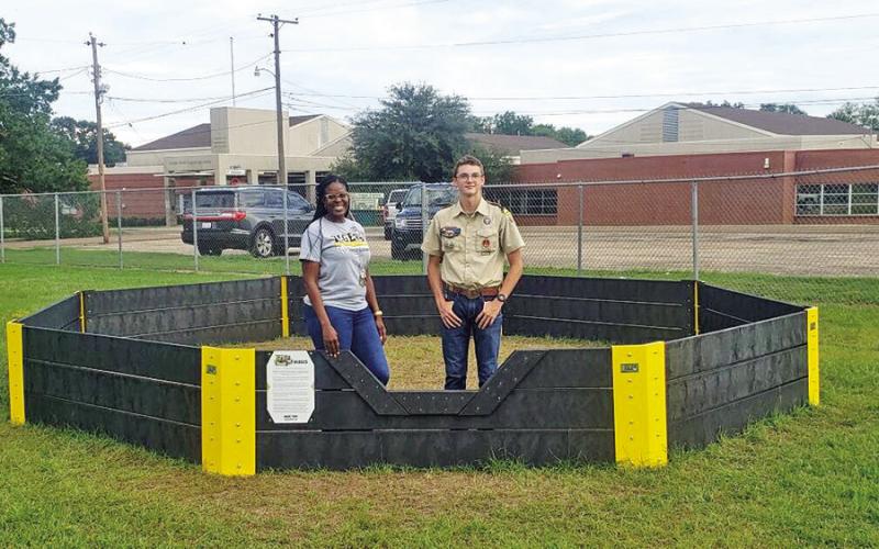 Conley Johnson with Corprew principal Karen Williams