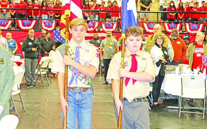 Cooper Rider (left) and James Smart (right) present the colors.