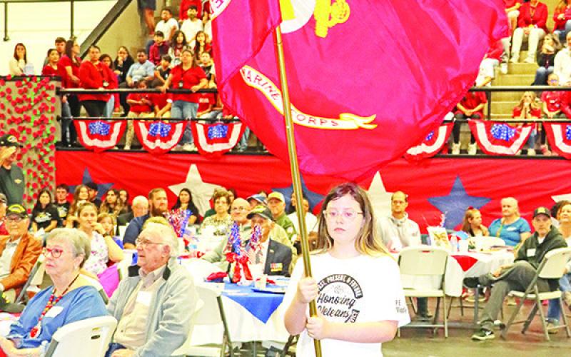 The Marine flag is carried by Wallace student, Chelsi Campbell.