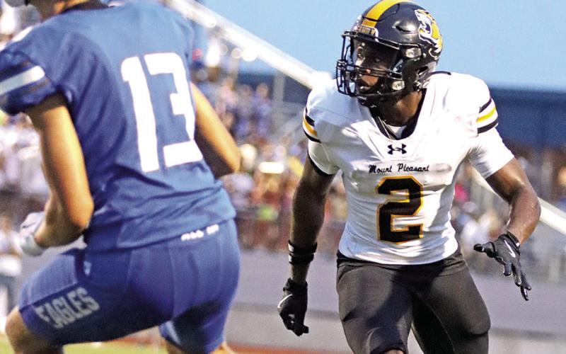 DeCorian Thomspon locks in on a Lindale receiver in the first half.