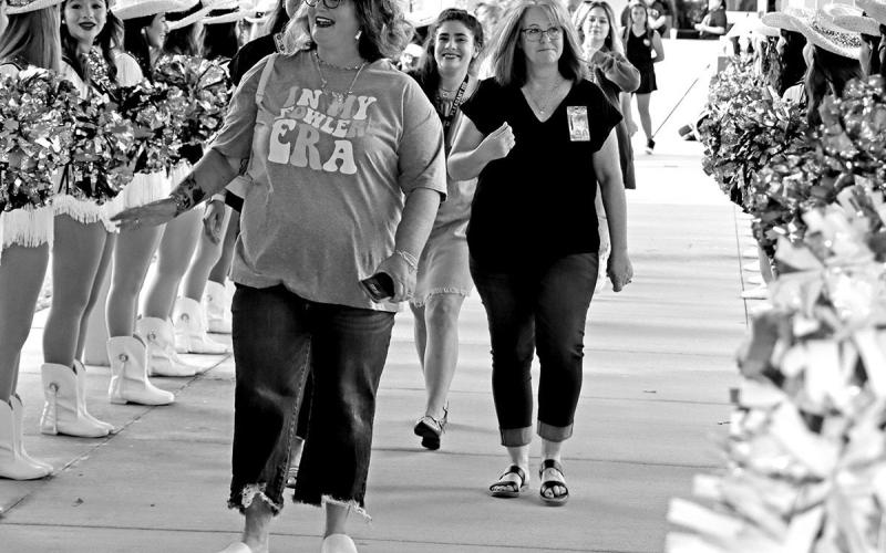 MPISD staff members are greeted by the MPHS Tiger Dolls as they enter the auditorium.