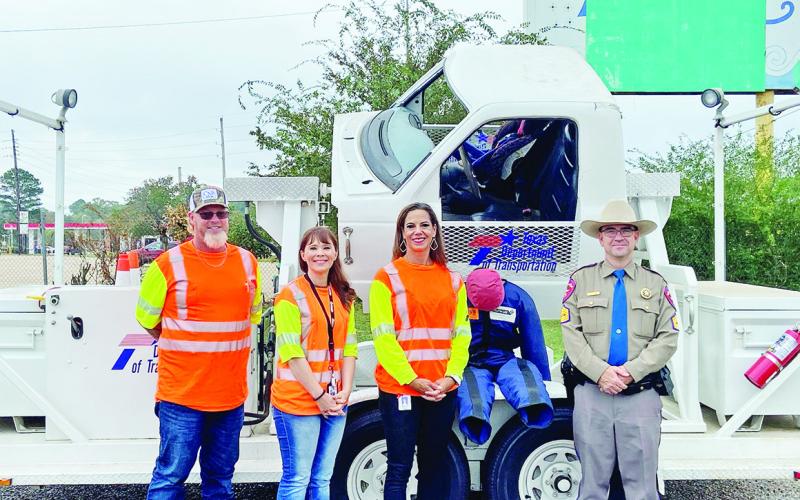 From left to right, TxDOT Equipment Mechanic Rusty Anderson, Public Information Officer Heather Deaton, District Engineer Rebecca Walls and Sargeant Gregg Williams with the DPS TRIBUNE PHOTO / RYLEIGH STEGALL