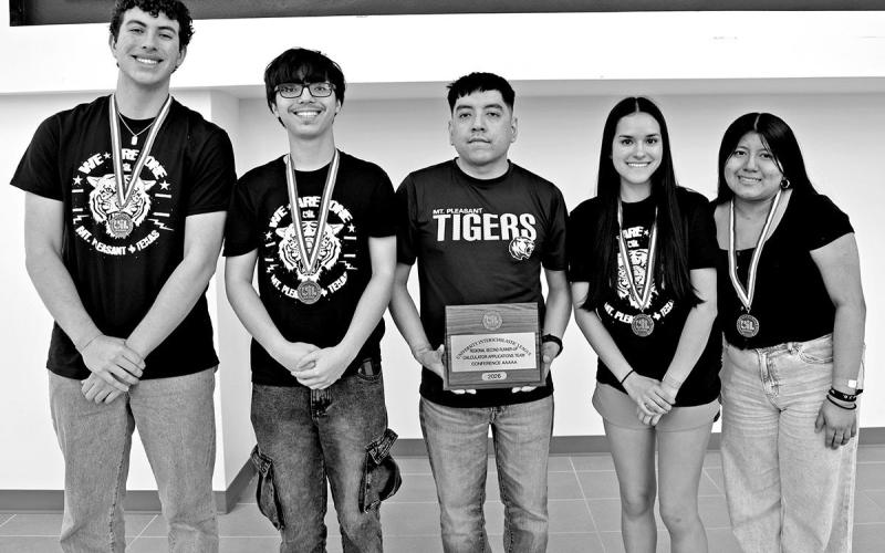 Calculator (L to R) Alessandro Greco, Julian Chancellor, Coach Osias Hernandez, Jamie Garrett, Karen Sandate