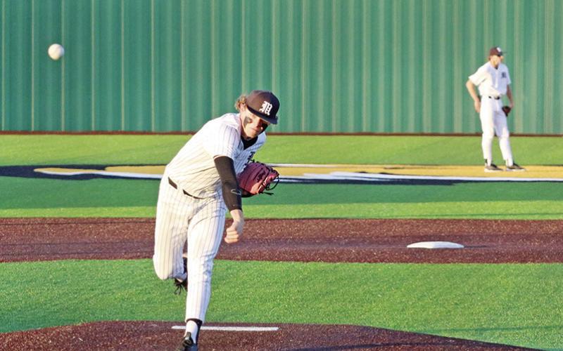 Mount Pleasant’s Drew Dyke delivers a pitch during a recent game. The Tigers played their final home game Friday against Texas High and will finish the season at Tyler High Tuesday and at Longview next Friday. TRIBUNE PHOTO / QUINTEN BOYD