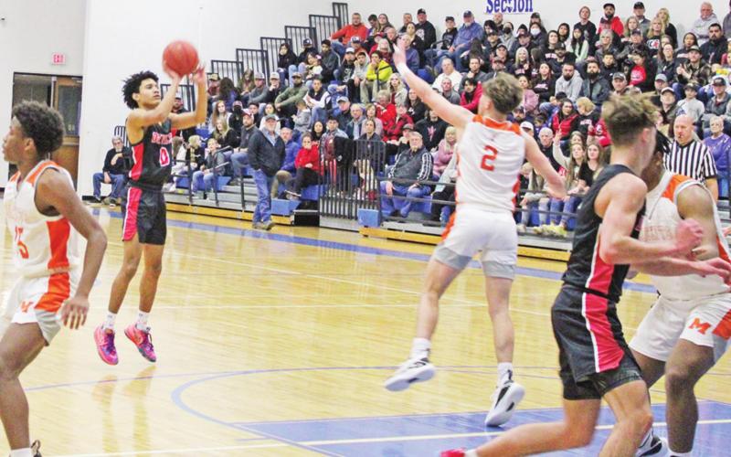 Jaydyn Haley takes a shot during Friday’s seeding game between Chapel Hill and Mineola. The Red Devils went into the playoffs as the district’s second seed and took on New Boston Tuesday at Marshall High School. TRIBUNE PHOTO / QUINTEN BOYD