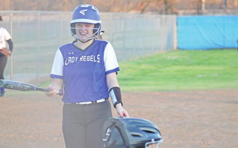 RIvercrest’s Macy Childres shares a laugh with crowd members between innings of a recent game. TRIBUNE PHOTOS / QUINTEN BOYD