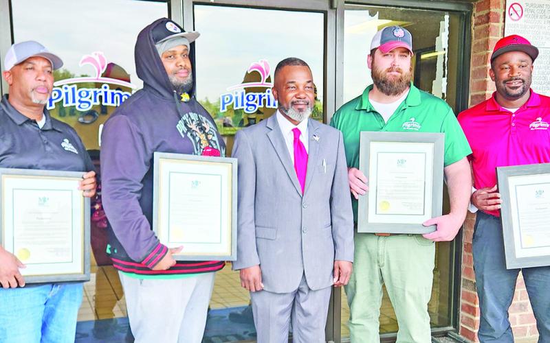Four men receive awards from the Mayor for their acts of bravey during an April 1st fire TRIBUNE PHOTO / NICOLE KIMBALL