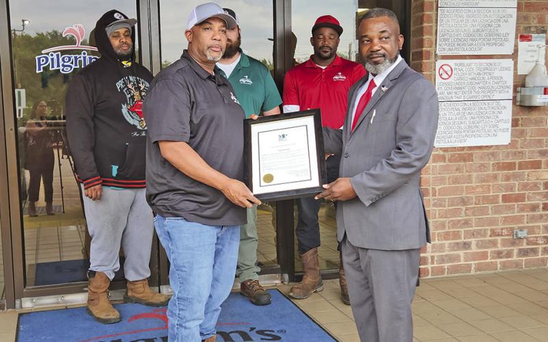 Mayor extends awards to four local Pilgrim’s workers turned heroes