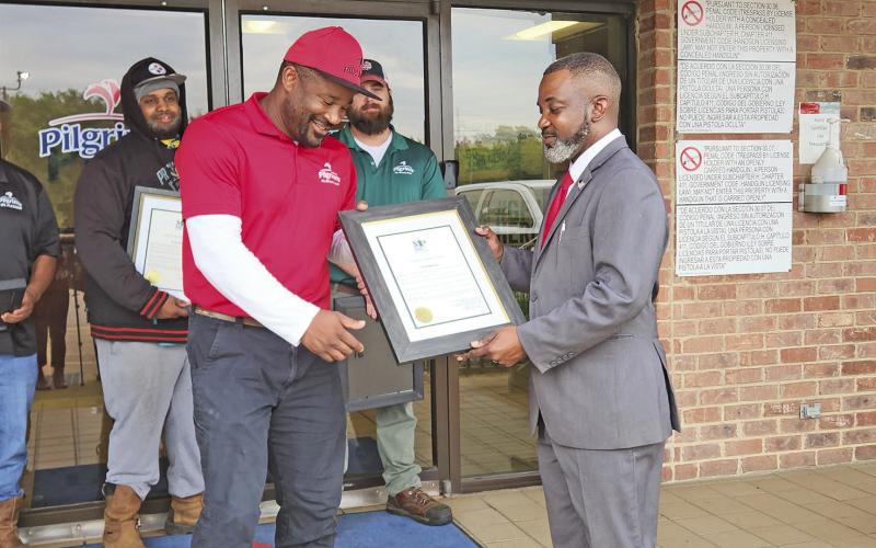 Mayor extends awards to four local Pilgrim’s workers turned heroes