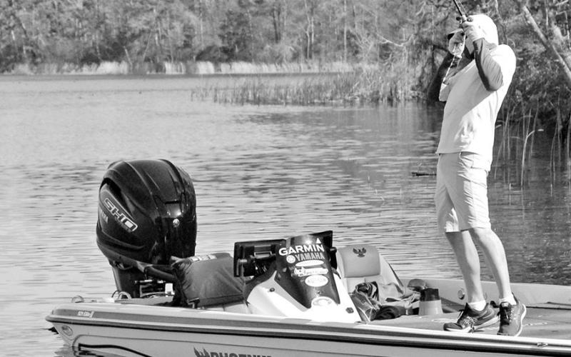 A few pitches later, Driscoll fooled the aggressive male into biting. After releasing the fish, he moved on to look for another.