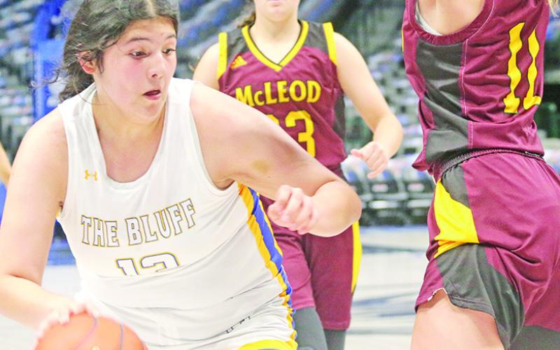 Yaretzi Sanchez drives to the basket against McLeod Wednesday afternoon. The Lady Bulldogs fell in their Court of Dreams game against the Lady Longhorns, 32-14. TRIBUNE PHOTOS / QUINTEN BOYD