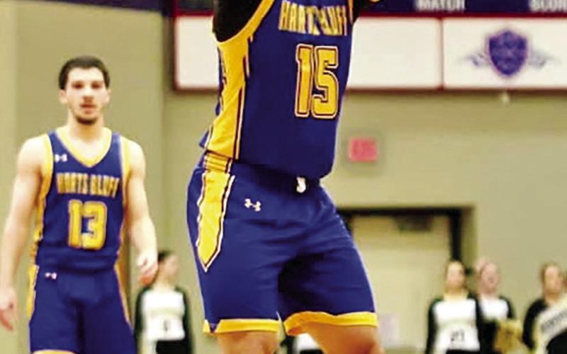Harts Bluff’s Cayden James (15) hits two huge free throws down the stretch in the area win over Alvord on Friday night. COURTESY PHOTO