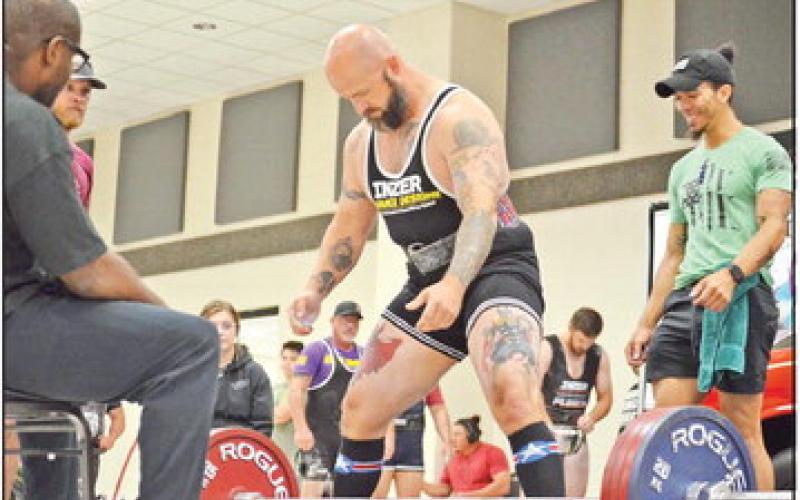 Powerlifting meet raises $13,000