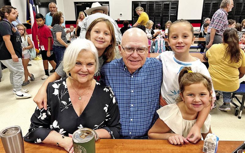 Grandparents Sandy and Larry Bible are pictured with their granddaughters Ava Claire Hageman, Holland Hageman and Chandler Bell.