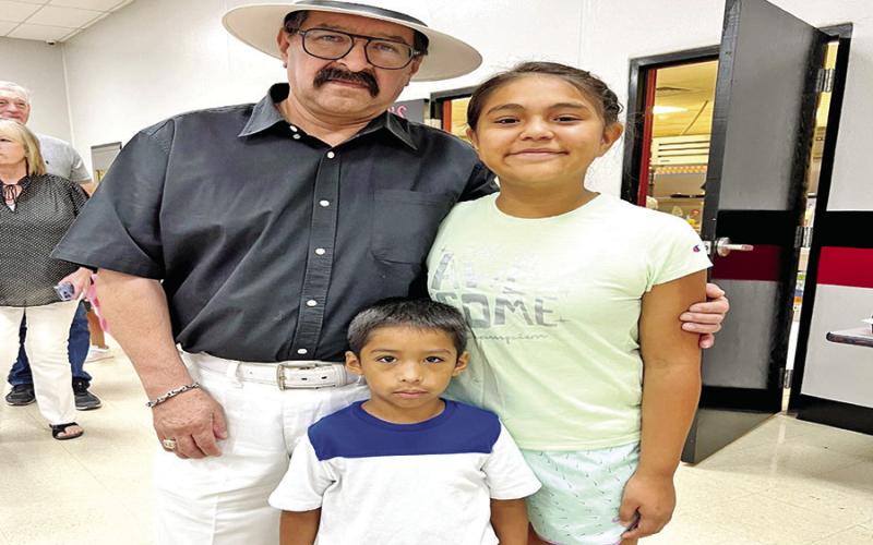 Grandfather Jorge Santiesteban is pictured with granddaughter Angelie Banda and grandson Joziah Santiesteban. COURTESY PHOTOS