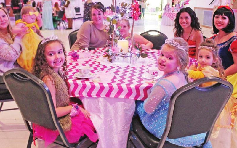 Moana and Snow White entertain the children CASA’s Fairy Dust Princess Ball on Jan. 29. TRIBUNE PHOTO / ELIZABETH LANNING