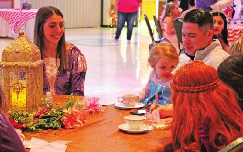Rapunzel also visited the children at the ball.