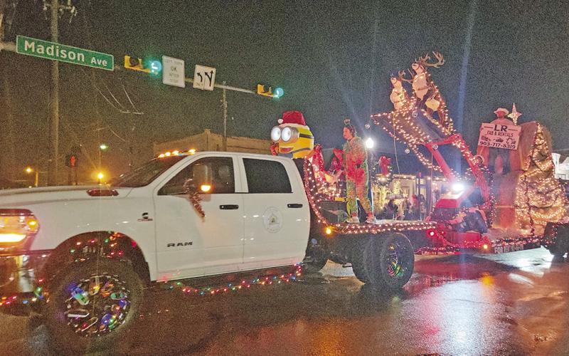 A Merry Musical Christmas parade sings on through rainy weather