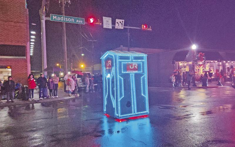 A Merry Musical Christmas parade sings on through rainy weather