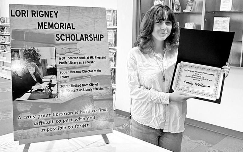 Mount Pleasant senior Emily Wellman received the Lori Rigney Scholarship from the Mount Pleasant Friends of the Library. The scholarship honors former Mount Pleasant Public Library Director Lori Rigney, who served in that position from 2002-09. COURTESY PHOTO
