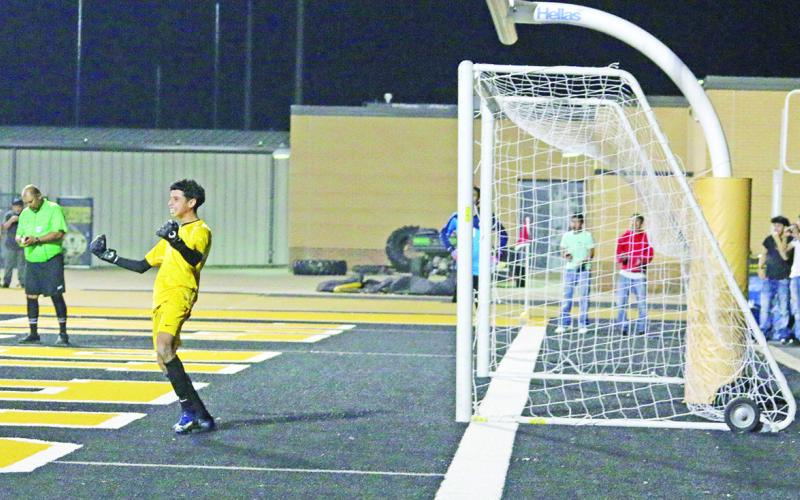 Mount Pleasant goalkeeper Edgar Lopez celebrates after stopping a Whitehouse penalty shot. The Tigers went on to win in penalties, 4-2. TRIBUNE PHOTO / QUINTEN BOYD