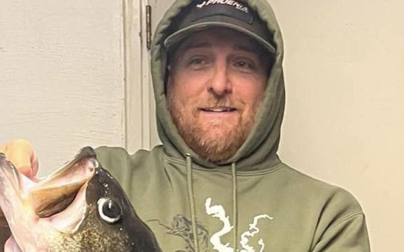 Fishing guide Jason Conn of Alba with the 17.03 pound giant he caught on February 13 at Lake O.H. Ivie. It’s the 8th largest bass ever caught in Texas and falls just short of the 17.06 pound lake record caught in February 2022 COURTESY PHOTO / JASON CONN