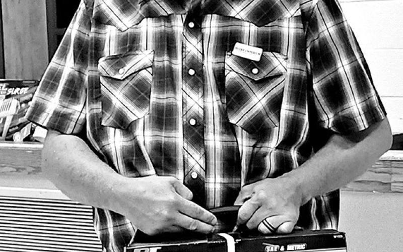 John Collins, raffle winner of a toolset TRIBUNE PHOTOS / NICOLE KIMBALL