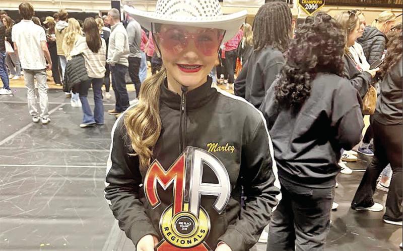 Marley Broach with her solo award