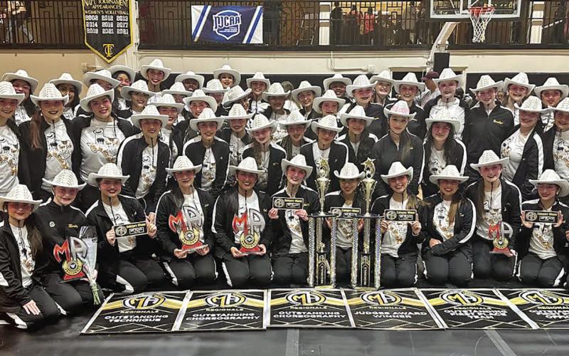 The Mount Pleasant High School Tiger Dolls with their awards COURTESY PHOTO