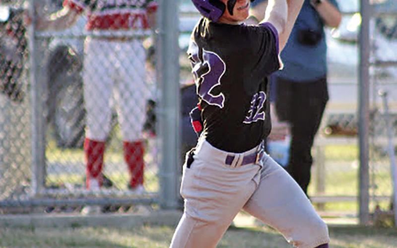 Bradon Wafford takes a cut at an Excel Christian pitch. COURTESY PHOTOS