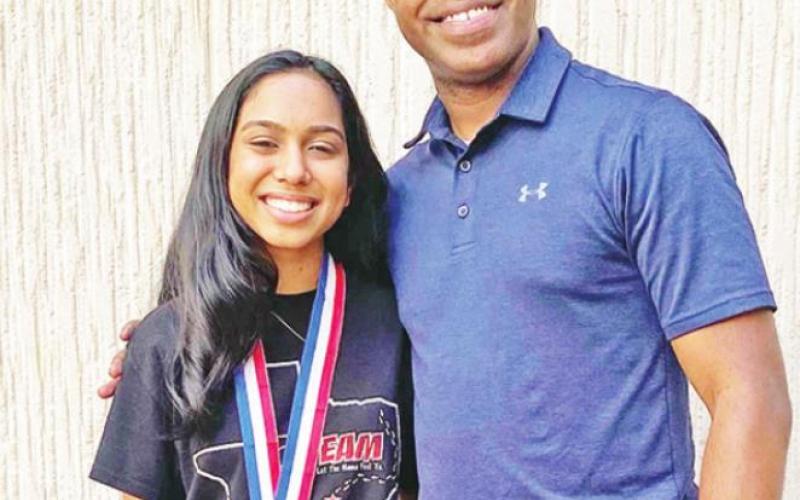 Presley Applegate (left) and Isha Mistry (right) celebrate with their coaches after their victories at the State UIL competition. COURTESY PHOTOS