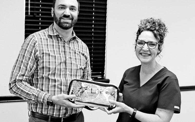 The Pediatric Clinic donated 10 LifeVac devices for use on all their campuses and 10 more mobile devices to be placed on buses. LifeVac is a portable suction device for clearing an upper airway in an emergency when someone is choking. Pictured are Dr. Michael Henry presenting LifeVacs to MPISD District Nurse, Lyndee Chappell, at the MPISD Board of Trustees meeting on Monday, February 27 COURTESY PHOTO