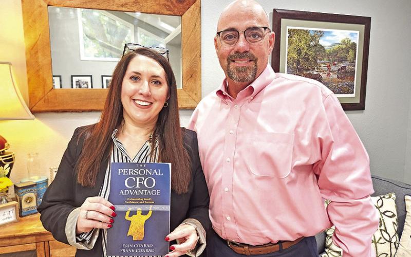 Erin and Frank Conrad with their brand new book, The Personal CFO Advantage