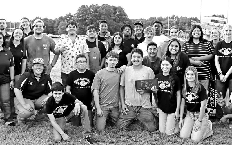 Members of the Mount Pleasant High School chapter of FFA with their trophy COURTESY PHOTOS