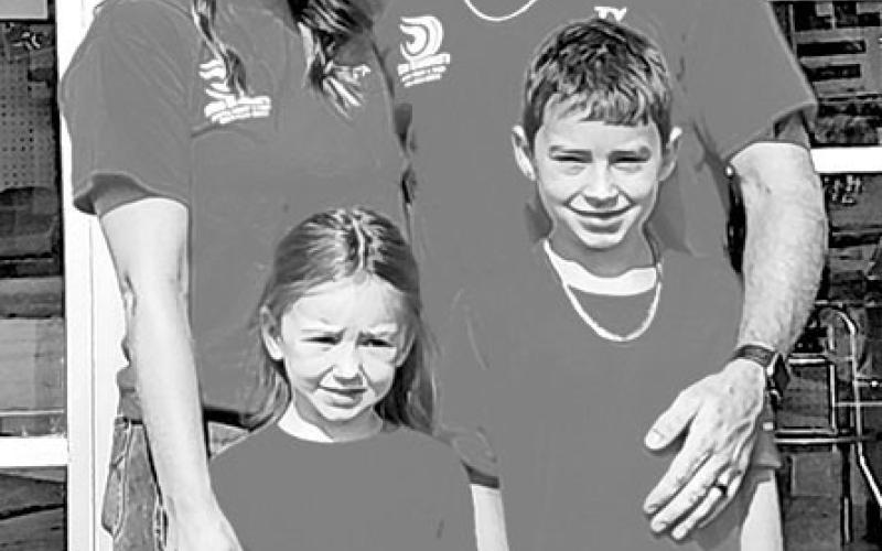 Braddock’s owner, Ty Calloway, with his wife and two children
