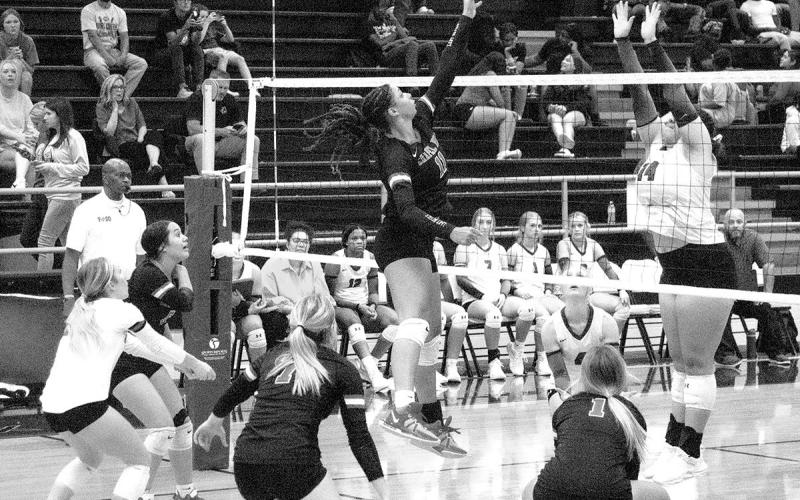 The Lady Red Devils from Chapel Hill swept a three game non-district matchup with the New Boston Lady Lions last week by a score of 25-15, 25-21 and 25- 13. COURTESY PHOTO