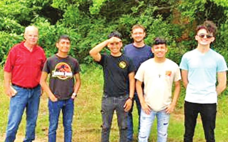 Stephen Borkowski with NTCC Honors Research Team outside of what used to be downtown Leesburg, where Shelby shopped. Also shown are honors students: Victor Diaz, Israel Perez, Evan Sears, John Rodriguez, and Cade Bennett. One can barely see what was once a brick mercantile, now hidden by trees to the right.