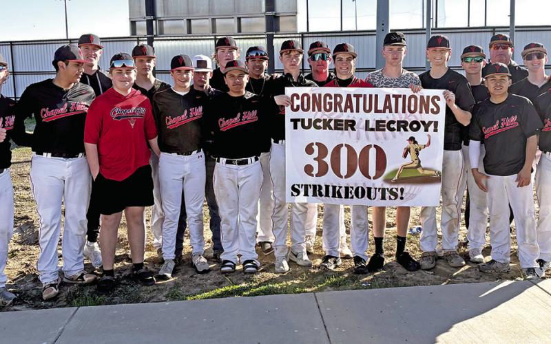 Tucker LeCroy is recognized by his teammates after surpassing 300 career varsity strikeouts during Chapel Hill’s early-season action. Courtesy Photo